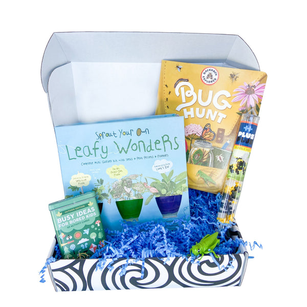 OuT of the Box educational occupational therapy activity set in a spring theme with books and materials on a white background.